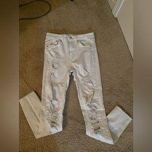 Women’s white ripped jeans